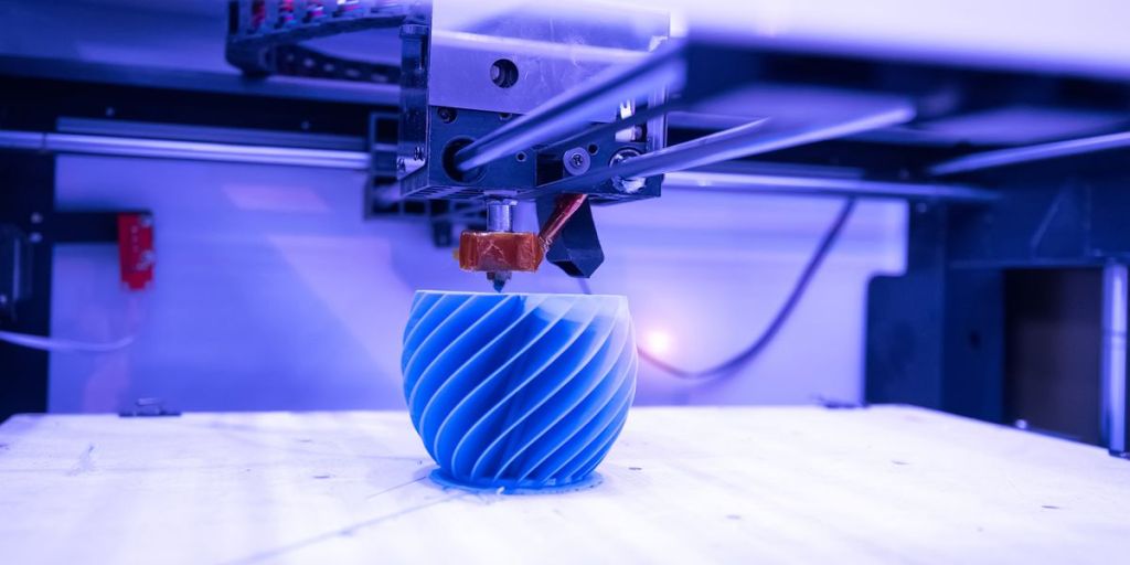 3D printers that print entire layers instead of single points at a time ...